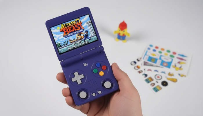 Anbernic RG34XXSP máy game retro cầm tay thiết kế gập clamshell màu tím phong cách Game Boy Advance SP